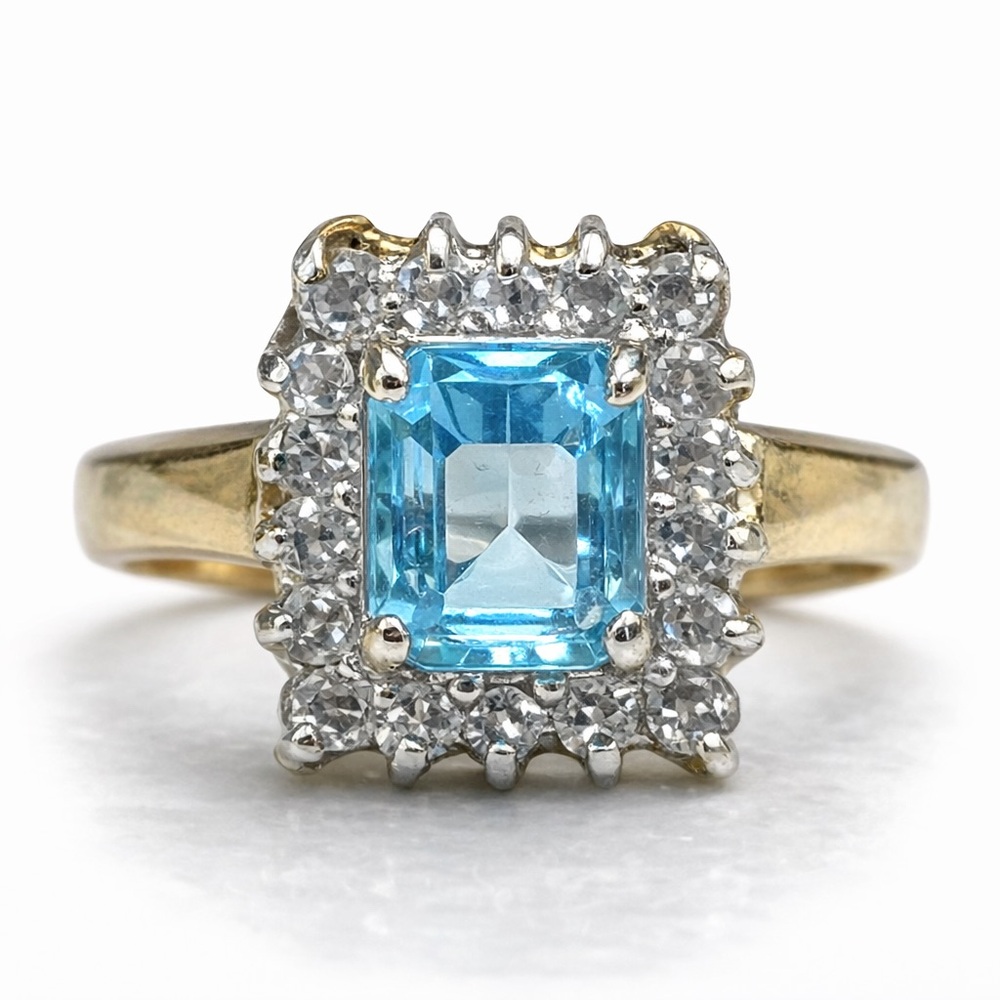 Blue Simulated Topaz Halo Ring Size 8 Gold Tone Clear Accent Stones